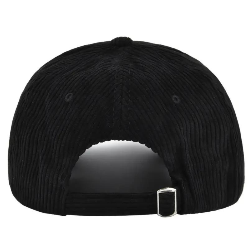 The back of a black corduroy baseball cap with a metal buckle for the strap.